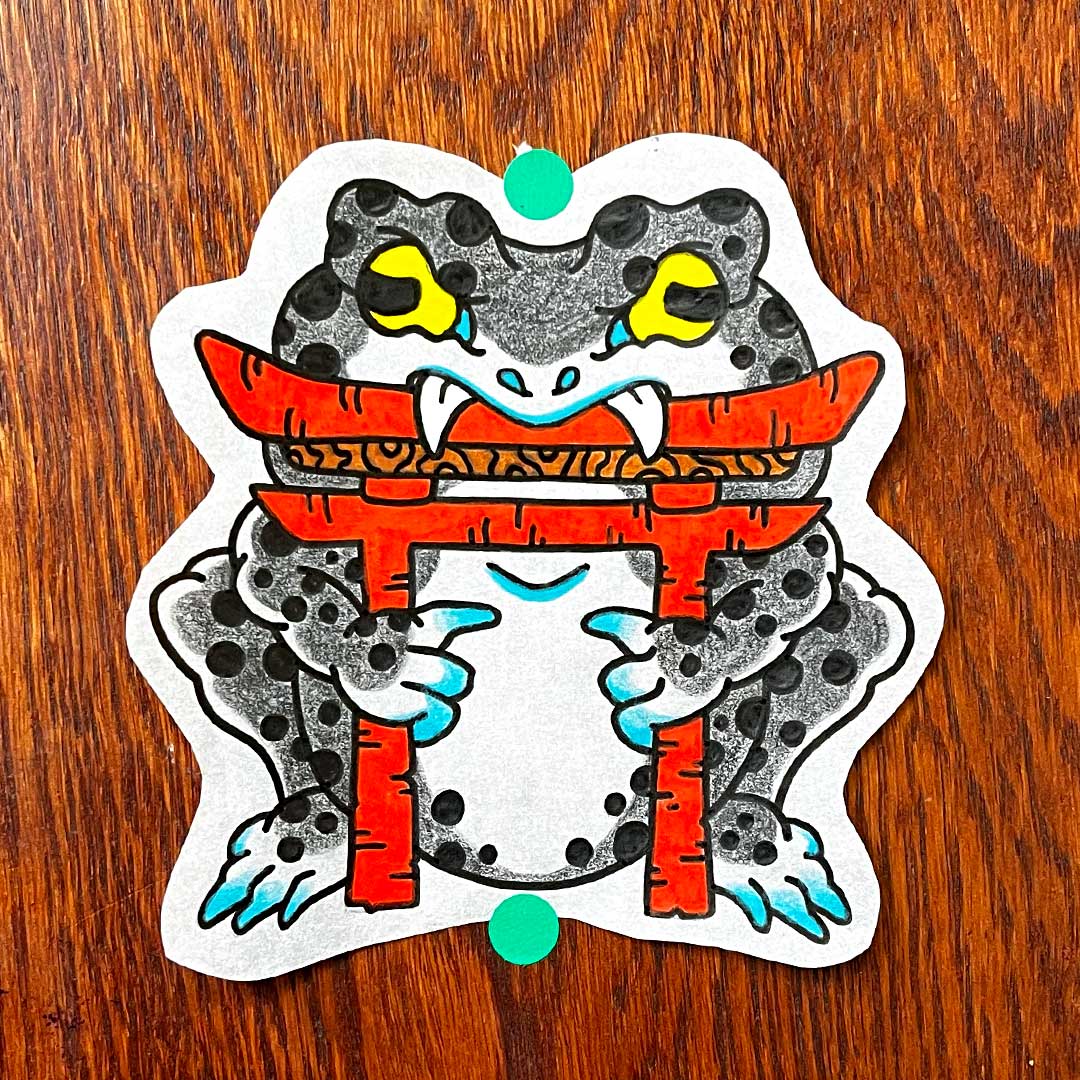 Red-Kirin-Tattoo-Piercing-Boutique-tattoo-sapo-tori-diseño-disponible-geru-tatuador